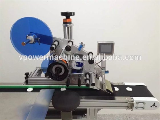 用于扁瓶或方瓶、肥皂的自动容器顶部不干胶贴标机