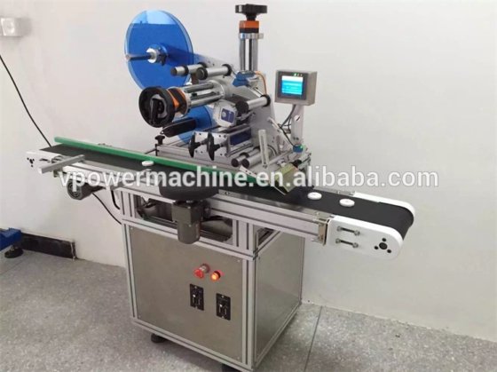 用于扁瓶或方瓶、肥皂的自动容器顶部不干胶贴标机