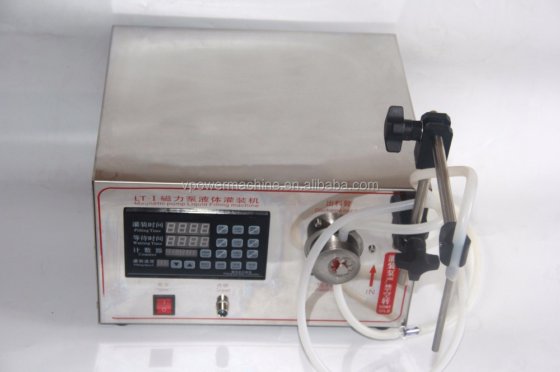 半自动单喷嘴磁力泵液体灌装机 用于软饮料、香水、油、饮料、化妆品液体灌装