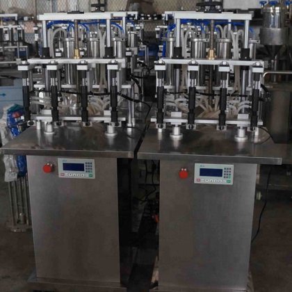 四头半自动真空香水瓶灌装机