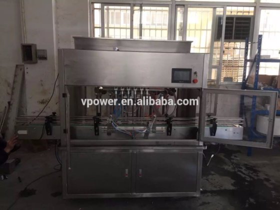 广州工厂生产的自动 4 喷嘴液体灌装机，用于化妆品、水、牛奶、洗发水、油、饮料、酒