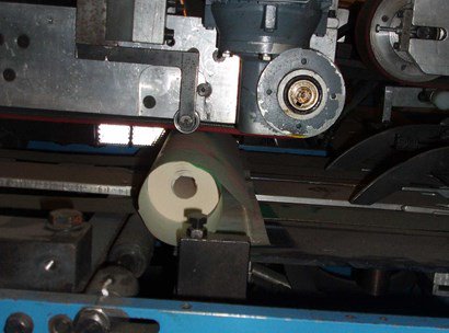 Automatic roll packing machine