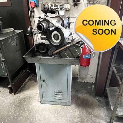 Sharpening machine for tips