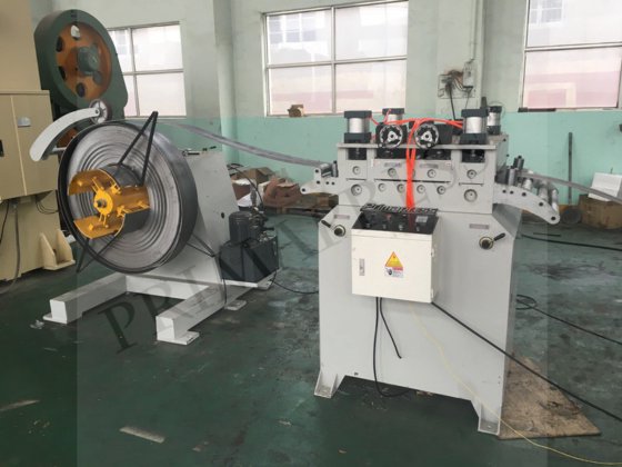 带开卷机、数控送料机、渐进式模具的自动冲孔生产线