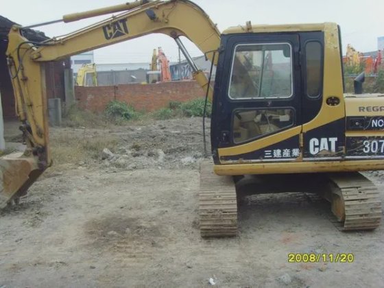 Cat 307b 重型设备挖掘机，操作重量 6500 千克，配备三菱发动机