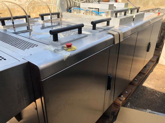 Machine à sceller les barquettes