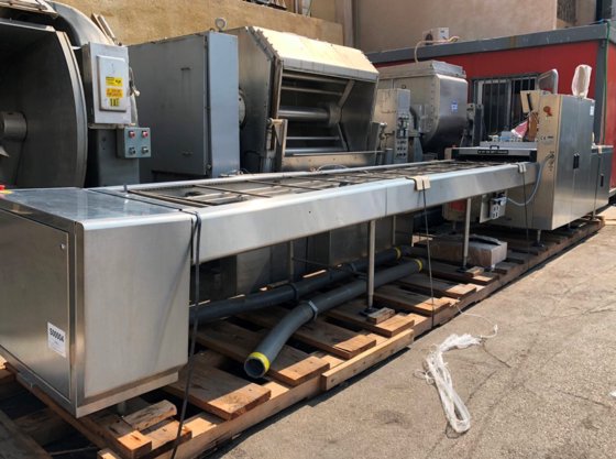 Machine à sceller les barquettes