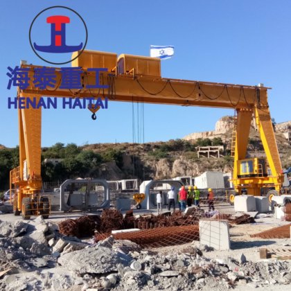 中国 Ht クレーン ゴム製タイヤを付けられた車輪販売のための油圧ガントリー クレーンのまたがりのキャリア