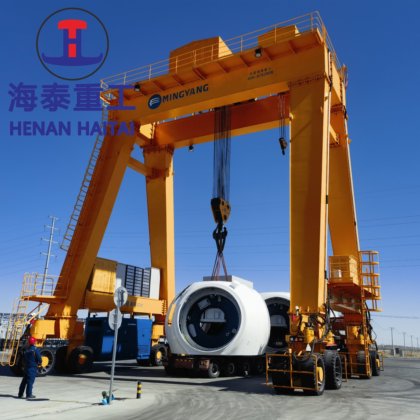 50 トンの移動式ゴムはまたがりのキャリアのガントリー クレーンの価格をタイヤを履きました