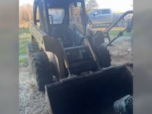 2000 John Deere 240