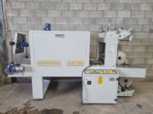 Automatic tray wrapping machine with