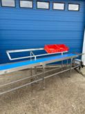Packing table with shelf for