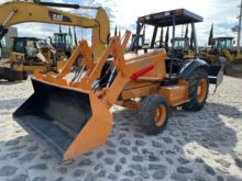 570LXT Backhoe