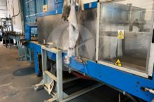 Shrink-wrap equipment with bundler