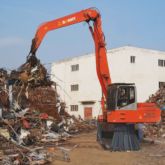 中国固定式电动抓斗起重机液压 22 吨固定式物料搬运机出售
