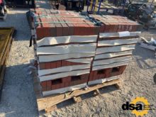 Pallet of Unused Red Bricks