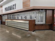 Pharmacy counters includes shelving and