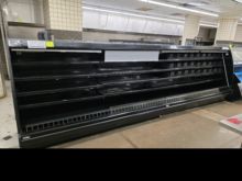 Low profile remote refrigerated case