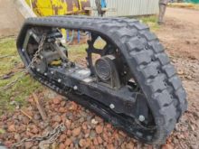 Chain system for mini loader