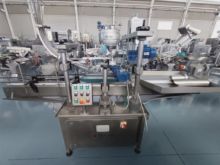 CAPSULEUSE AUTOMATIQUE DE BOCAUX EN