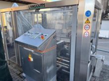 Adhesive label applicator