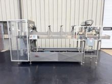 Combi Packaging Systems Automatic Drop