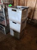 Four Tin-Sided Milk Crates