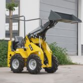 4 輪駆動の無料輸送新型ウォークトラック油圧ミニ ガーデンスキッドステア用フロントローダ付きスキッドステアローダ ローダ